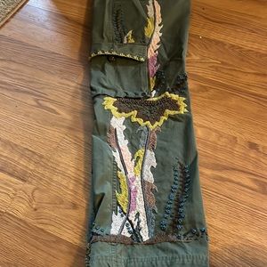 Awesome one of a kind embroidered cargo pants with stud detailing.